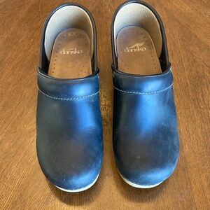 Dansko Black Leather Clogs with Tan Sole